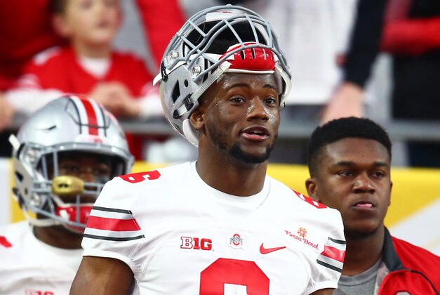 Jan 1, 2016; Glendale, AZ, USA; Ohio State Buckeyes quarterback Torrance Gibson (6) against the Notre Dame Fighting Irish during the 2016 Fiesta Bowl at University of Phoenix Stadium. The Buckeyes defeated the Fighting Irish 44-28. Mandatory Credit: Mark J. Rebilas-USA TODAY Sports