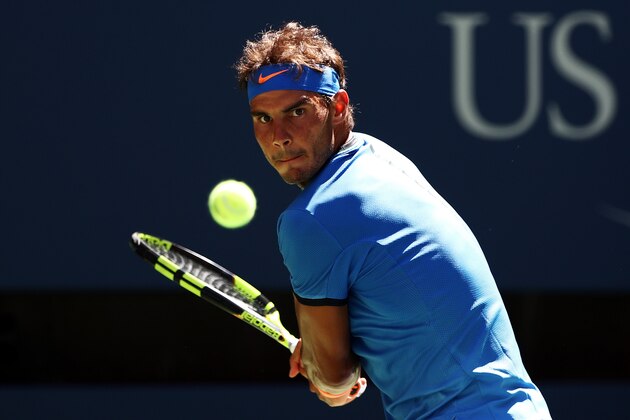 NEW YORK, NY - AUGUST 29: Rafael Nadal of Spain returns a shot to Denis Istomin of Uzbekistan during his first round Men's Singles match on Day One of the 2016 US Open at the USTA Billie Jean King National Tennis Center on August 29, 2016 in the Flushing neighborhood of the Queens borough of New York City. (Photo by Elsa/Getty Images) NEW YORK, NY - AUGUST 29: Rafael Nadal of Spain returns a shot to Denis Istomin of Uzbekistan during his first round Men's Singles match on Day One of the 2016 US Open at the USTA Billie Jean King National Tennis Center on August 29, 2016 in the Flushing neighborhood of the Queens borough of New York City. (Photo by Elsa/Getty Images)