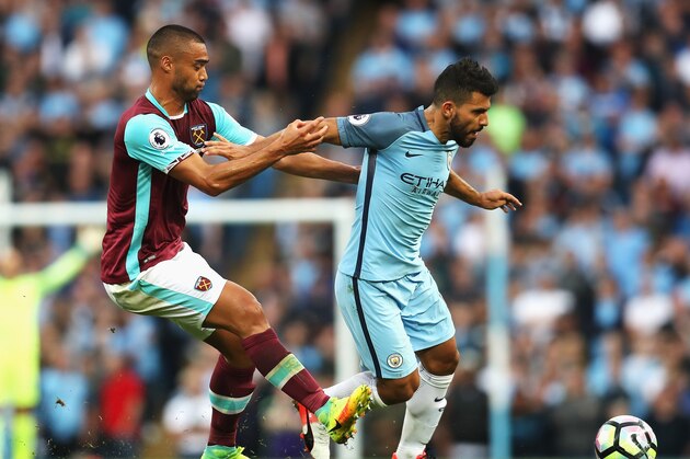 MANCHESTER, ENGLAND - AUGUST 28:  Sergio Aguero of Manchester City is challenged by Winston Reid of West Ham United during the Premier League match between Manchester City and West Ham United at Etihad Stadium on August 28, 2016 in Manchester, England.  (Photo by Chris Brunskill/Getty Images)