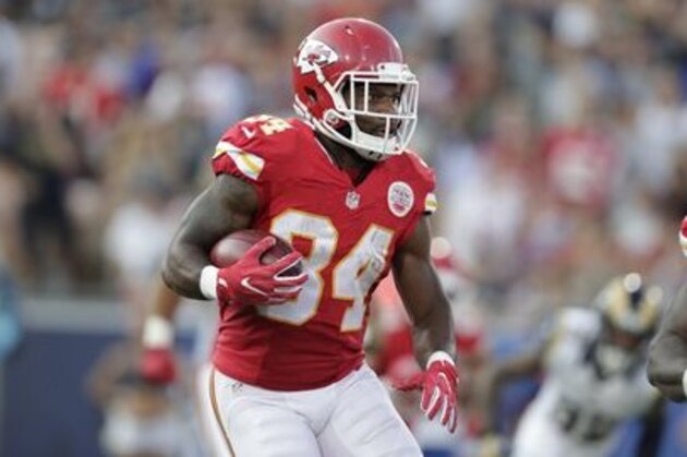 Kansas City Chiefs running back Knile Davis runs the ball during the first half of a preseason NFL football game against the Los Angeles Rams, Saturday, Aug. 20, 2016, in Los Angeles. (AP Photo/Ryan Kang)