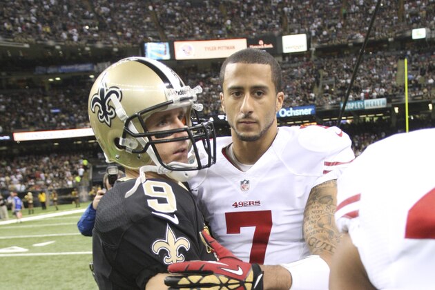 NEW ORLEANS, LA - NOVEMBER 17: Colin Kaepernick #7 of the San Francisco 49ers embraces with during Drew Brees #9 of the New Orleans Saints prior to the game at the Superdome on November 17, 2013 in New Orleans, Louisiana. The Saints defeated the 49ers 23-30. (Photo by Michael Zagaris/San Francisco 49ers/Getty Images)