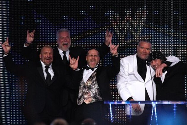(left to right) Paul Levesque aka Triple H, Kevin Nash, Michael Shawn Hickenbottom aka Shawn Michaels, 2014 inductee Scott Hall aka Razor Ramon, and Sean Waltman aka X-Pac, are seen at the WWE Hall of Fame Induction at the Smoothie King Center in New Orleans on Saturday, April 5, 2014. (Jonathan Bachman/AP Images for WWE)
