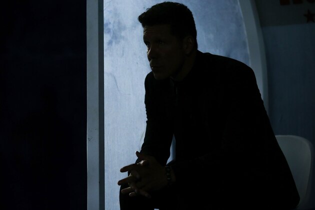 LEGANES, SPAIN - AUGUST 27: Head coach Diego Pablo Simeone of Atletico de Madrid rub his hands sitted on the bench prior to start the La Liga match between Club Deportivo Leganes and Club Atletico de Madrid at Estadio Municipal de Butarque on August 27, 2016 in Leganes, Spain. (Photo by Gonzalo Arroyo Moreno/Getty Images)