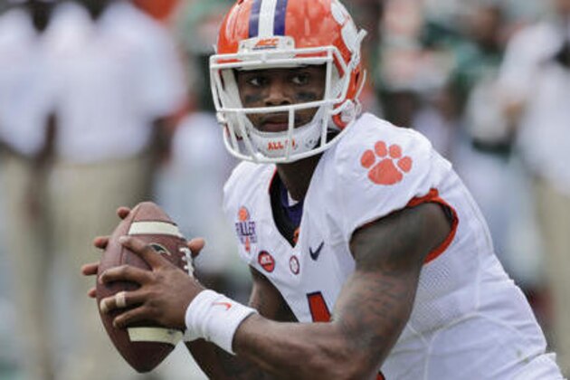 FILE - In this Oct. 24, 2015, file photo, Clemson quarterback Deshaun Watson drops back to pass during the first half of an NCAA College football game against Miami, in Miami Gardens, Fla. Watson's hardest choices this fall might be wondering where to go with the football. (AP Photo/Wilfredo Lee, File)
