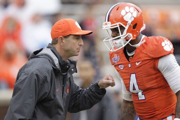 CLEMSON, SC - OCTOBER 10: Head Coach Dabo Swinney of the Clemson Tigers talks with quarterback Deshaun Watson #4 prior to their game against the Georgia Tech Yellow Jackets at Memorial Stadium on October 10, 2015 in Clemson, South Carolina. (Photo by Tyler Smith/Getty Images)