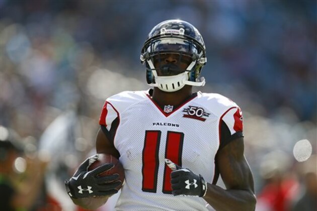 Atlanta Falcons wide receiver Julio Jones (11) runs with the ball after a catch against the Atlanta Falcons during an NFL football game in Jacksonville, Fla., Sunday, Dec. 20, 2015. (Jeff Haynes/AP Images for Panini)