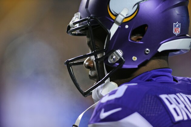 MINNEAPOLIS, MN - DECEMBER 27:  Teddy Bridgewater #5 of the Minnesota Vikings tries to warm up pregame against the New York Giants on December 27, 2015 at TCF Bank Stadium in Minneapolis, Minnesota. (Photo by Adam Bettcher/Getty Images)