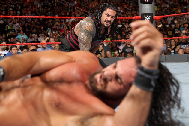 Roman Reigns and Seth Rollins