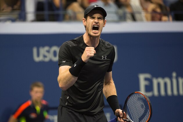 Andy Murray (R) of Great Britain celebrates a point against Lukas Rosol of the Czech Republic during their 2016 US Open men's singles match at the USTA Billie Jean King National Tennis Center on August 30, 2016 in New York.  / AFP / Don EMMERT        (Photo credit should read DON EMMERT/AFP/Getty Images)