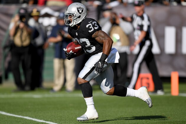OAKLAND, CA - AUGUST 27:  Running back DeAndre Washington #33 of the Oakland Raiders returns a kickoff against Tennessee Titans in the first half of their preseason football game at the Oakland Coliseum on August 27, 2016 in Oakland, California.  (Photo by Thearon W. Henderson/Getty Images)