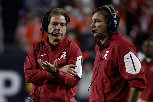 GLENDALE, AZ - JANUARY 11:  Head coach Nick Saban and Defensive coordinator Kirby Smart of the Alabama Crimson Tide look on from the field during the 2016 College Football Playoff National Championship Game against the Clemson Tigers at University of Phoenix Stadium on January 11, 2016 in Glendale, Arizona.  (Photo by Sean M. Haffey/Getty Images)