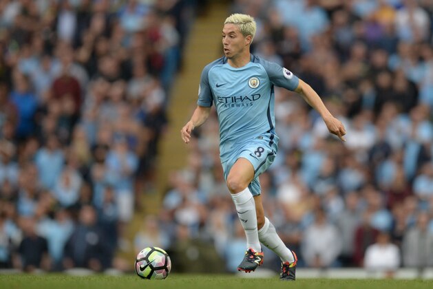 Manchester City's French midfielder Samir Nasri runs with the ball during the English Premier League football match between Manchester City and West Ham United at the Etihad Stadium in Manchester, north west England, on August 28, 2016. / AFP / OLI SCARFF / RESTRICTED TO EDITORIAL USE. No use with unauthorized audio, video, data, fixture lists, club/league logos or 'live' services. Online in-match use limited to 75 images, no video emulation. No use in betting, games or single club/league/player publications.  /         (Photo credit should read OLI SCARFF/AFP/Getty Images)