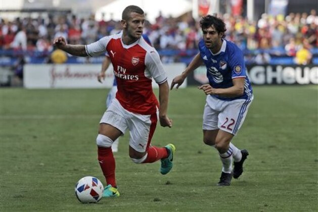 Arsenal midfielder Jack Wilshere, left, controls the ball next to MLS All-Stars' Kaka during the first half of the MLS All-Star soccer game Thursday, July 28, 2016, in San Jose, Calif. (AP Photo/Marcio Jose Sanchez)
