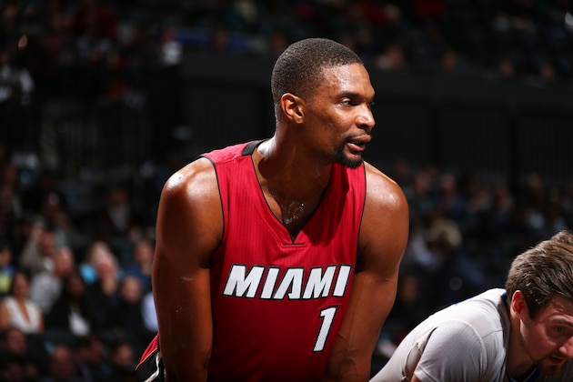 BROOKLYN, NY - JANUARY 26:  Chris Bosh #1 of the Miami Heat looks on during the game against the Brooklyn Nets on January 26, 2016 at Barclays Center in the Brooklyn borough of New York City. NOTE TO USER: User expressly acknowledges and agrees that, by downloading and or using this Photograph, user is consenting to the terms and conditions of the Getty Images License Agreement. Mandatory Copyright Notice: Copyright 2016 NBAE (Photo by Ned Dishman/NBAE via Getty Images)