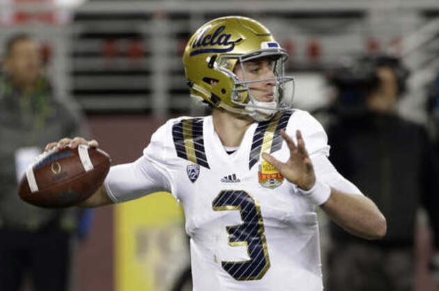 FILE- In this Dec. 26, 2015 file photo, UCLA quarterback Josh Rosen throws against Nebraska during the first half of the Foster Farms Bowl NCAA college football game, in Santa Clara, Calif. (AP Photo/Marcio Jose Sanchez, File)
