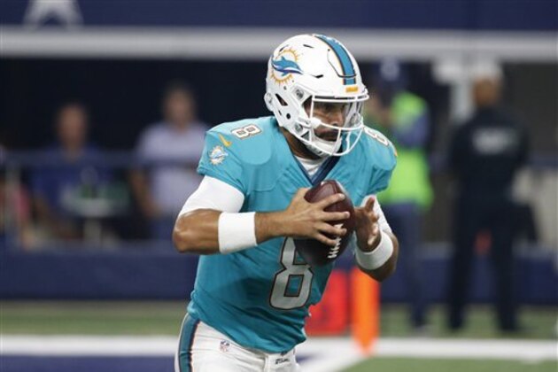 Miami Dolphins quarterback Matt Moore (8) runs the ball in the first half of an NFL preseason football game against the Dallas Cowboys on Friday, Aug. 19, 2016, in Arlington, Texas. (AP Photo/Michael Ainsworth)