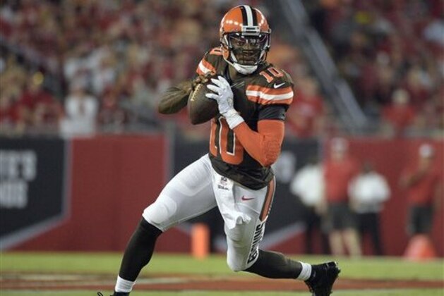 Cleveland Browns quarterback Robert Griffin III (10) runs aTampa Bay Buccaneers during the first quarter of an NFL football game Friday, Aug. 26, 2016, in Tampa, Fla. (AP Photo/Phelan M. Ebenhack)