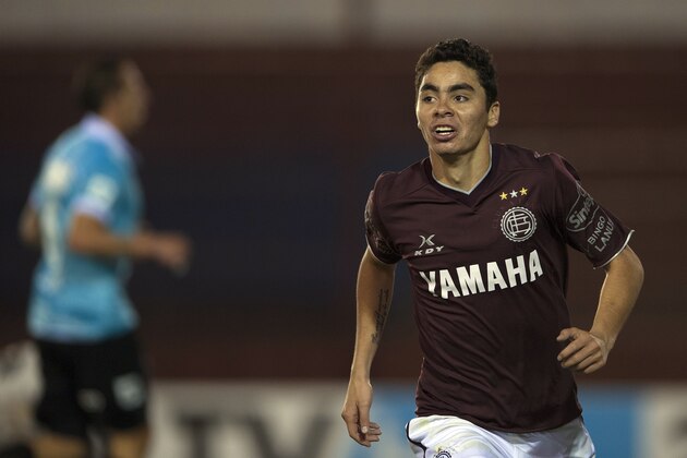 Argentina's Lanus midfielder Miguel Almiron celebrates after scoring the team's fourth goal against Argentina's Belgrano during a Copa Sudamericana 2015 second stage second leg football match at Lanus stadium in Lanus, Buenos Aires, Argentina, on September 17, 2015. AFP PHOTO / ALEJANDRO PAGNI        (Photo credit should read ALEJANDRO PAGNI/AFP/Getty Images)