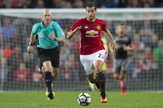 Manchester United's Henrikh Mkhitaryan takes the ball downfield during the English Premier League soccer match between Manchester United and Southampton at Old Trafford Stadium, Manchester, England, Friday, Aug. 19, 2016. (AP Photo/Jon Super) Manchester United's Henrikh Mkhitaryan takes the ball downfield during the English Premier League soccer match between Manchester United and Southampton at Old Trafford Stadium, Manchester, England, Friday, Aug. 19, 2016. (AP Photo/Jon Super)