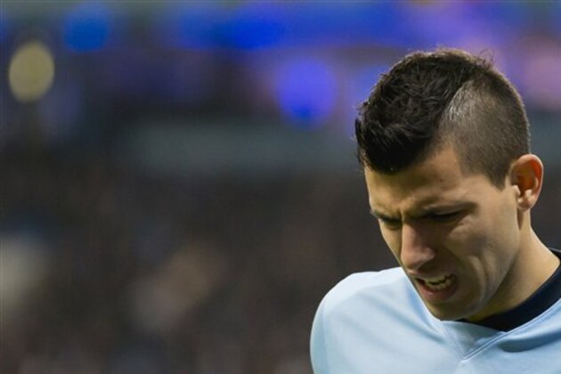 Manchester City's Sergio Aguero walks off injured during the English Premier League soccer match between Manchester City and Everton at the Etihad Stadium, Manchester, England, Saturday Dec. 6, 2014. (AP Photo/Jon Super)