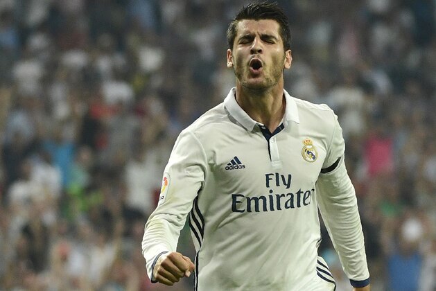 Real Madrid's forward Alvaro Morata celebrates after scoring during the Spanish league football match Real Madrid CF vs RC Celta de Vigo at the Santiago Bernabeu stadium in Madrid on August 27, 2016. / AFP / PIERRE-PHILIPPE MARCOU        (Photo credit should read PIERRE-PHILIPPE MARCOU/AFP/Getty Images)