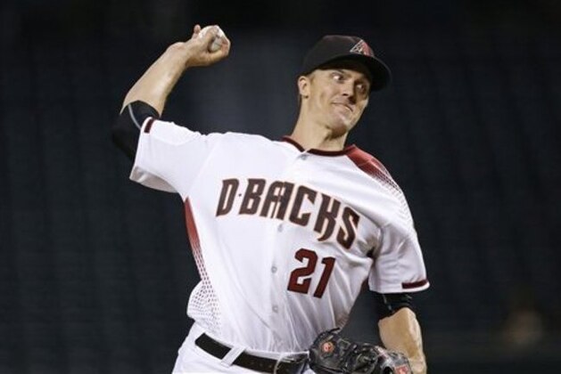 Arizona Diamondbacks' Zack Greinke throws a pitch against the Atlanta Braves during the first inning of a baseball game Wednesday, Aug. 24, 2016, in Phoenix. The Diamondbacks defeated the Braves 10-9 in 11 innings. (AP Photo/Ross D. Franklin)