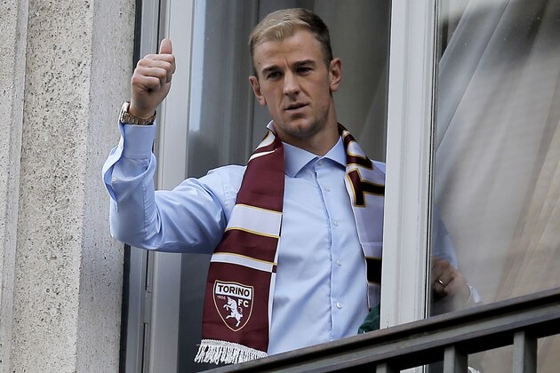 British goalkeeper Joe Hart poses with a supporter shirt upon his arrival for a medical check before joining the Torino football club from former club Manchester City on August 30, 2016 in Turin.
England goalkeeper Joe Hart arrived in Turin on Agust 30 ahead of undergoing a medical that should see him sign a season-long loan deal with the unfashionable Serie A club.
 Hart, 29, has fallen out of favour with Pep Guardiola at Manchester City following the signing of Claudio Bravo from Barcelona and is set to join Torino in a bid to preserve his club future and international career following England's spectacular Euro 2016 exit.
 / AFP / Marco BERTORELLO        (Photo credit should read MARCO BERTORELLO/AFP/Getty Images)