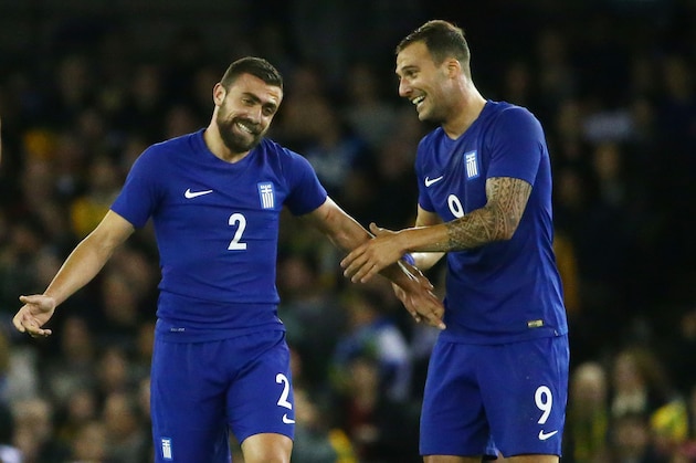 MELBOURNE, AUSTRALIA - JUNE 07:  Giannis Maniatis of Greece is congratulated by Apostolos Vellios after kicking a goal from half way during the International Friendly match between the Australian Socceroos and Greece at Etihad Stadium on June 7, 2016 in Melbourne, Australia.  (Photo by Scott Barbour/Getty Images)