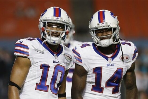 Buffalo Bills wide receiver Robert Woods (10) and wide receiver Sammy Watkins (14) share a laugh during warmups before the start of an NFL football game against the Miami Dolphins, Thursday, Nov. 13, 2014 in Miami Gardens, Fla. (AP Photo/Alan Diaz)