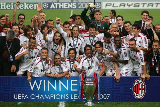 ATHENS, GREECE - MAY 23:  Milan captain, Paolo Maldini (C) and his team celebrate with the trophy following their 2-1 victory during the UEFA Champions League Final match between Liverpool and AC Milan at the Olympic Stadium on May 23, 2007 in Athens, Greece.  (Photo by Jamie McDonald/Getty Images)