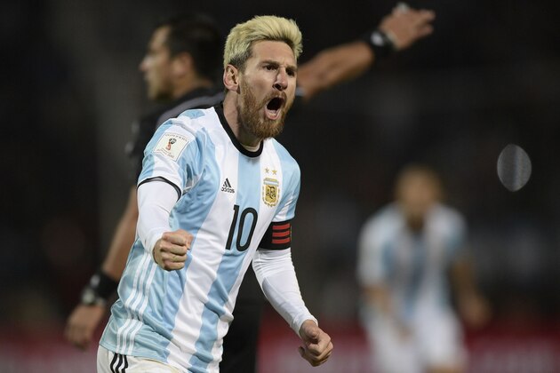 Argentina's Lionel Messi celebrates after scoring against Uruguay during the FIFA World Cup 2018 qualifier football match between Argentina and Uruguay in Mendoza, Argentina, on September 1, 2016. / AFP / JUAN MABROMATA        (Photo credit should read JUAN MABROMATA/AFP/Getty Images)