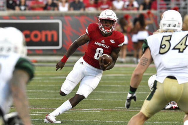 Louisville quarterback Lamar Jackson (8) carries against Charlotte during the first quarter of an NCAA college football game, Thursday, Sept. 1, 2016, in Louisville, Ky. (AP Photo/Timothy D. Easley)
