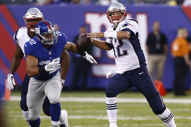EAST RUTHERFORD, NJ - SEPTEMBER 01: Tom Brady #12 of the New England Patriots looks for an open man as Kerry Wynn #72 of the New York Giants covers during their preseason game at MetLife Stadium on September 1, 2016 in East Rutherford, New Jersey. (Photo by Jeff Zelevansky/Getty Images)