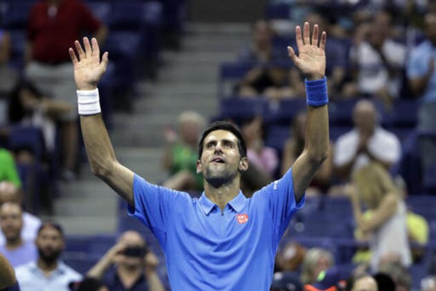 Novak Djokovic, of Serbia, waves after defeating Jerzy Janowicz, of Poland, during the first round of the US Open tennis tournament, Monday, Aug. 29, 2016, in New York. (AP Photo/Darron Cummings)