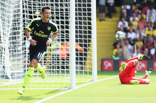 WATFORD, ENGLAND - AUGUST 27:  Mesut Ozil of Arsenal scores his sides third goal during the Premier League match between Watford and Arsenal at Vicarage Road on August 27, 2016 in Watford, England.  (Photo by Christopher Lee/Getty Images)