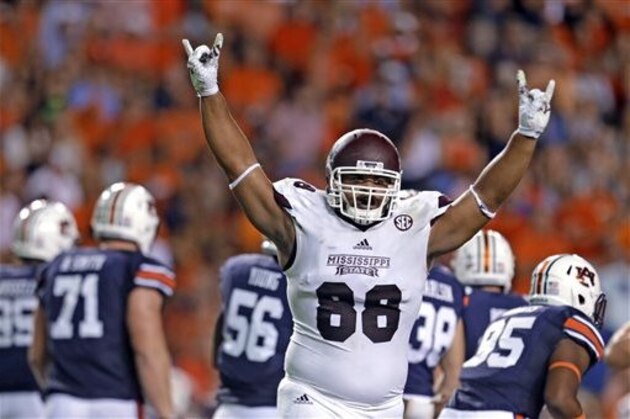 Mississippi State defensive lineman Nick James (88) celebrates after Auburn's Daniel Carlson (38) missed a field goal during the first half of an NCAA college football game, Saturday, Sept. 26, 2015, in Auburn, Ala. (AP Photo/Butch Dill)