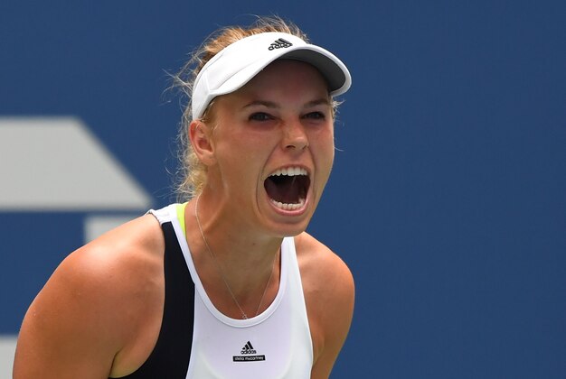 Aug 31, 2016; New York, NY, USA; Caroline Wozniacki of Denmark reacts after beating Svetlana Kuznetsova of Russia on day three of the 2016 U.S. Open tennis tournament at USTA Billie Jean King National Tennis Center. Mandatory Credit: Robert Deutsch-USA TODAY Sports