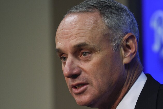 KANSAS CITY, MO - APRIL 5:  Major League Baseball Commissioner Rob Manfred talks with media prior to a game between the New York Mets and Kansas City Royals at Kauffman Stadium on April 5, 2016 in Kansas City, Missouri. (Photo by Ed Zurga/Getty Images)