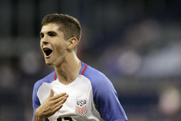 U.S. forward Christian Pulisic reacts after scoring against Bolivia during the second half of an international friendly soccer match, Saturday, May. 28, 2016, in Kansas City, Kan. (AP Photo/Colin E. Braley)