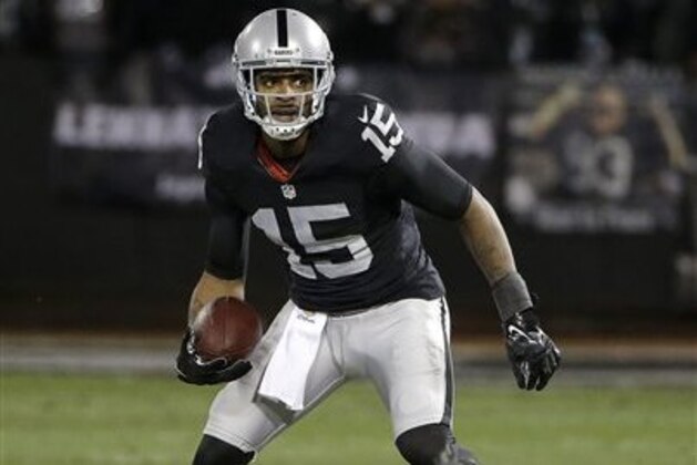 Oakland Raiders wide receiver Michael Crabtree (15) against the San Diego Chargers during an NFL football game in Oakland, Calif., Thursday, Dec. 24, 2015. (AP Photo/Marcio Jose Sanchez) Oakland Raiders wide receiver Michael Crabtree (15) against the San Diego Chargers during an NFL football game in Oakland, Calif., Thursday, Dec. 24, 2015. (AP Photo/Marcio Jose Sanchez)