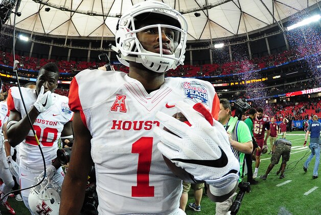 ATLANTA, GA - DECEMBER 31: Greg Ward, Jr. #1 of the Houston Cougars celebrates after the Chick-Fil-A Peach Bowl against the Florida State Seminoles at the Georgia Dome on December 31, 2015 in Atlanta, Georgia. Photo by Scott Cunningham/Getty Images)