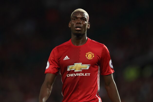 MANCHESTER, ENGLAND - AUGUST 19: Paul Pogba of Manchester United during the Premier League match between Manchester United and  Southampton at Old Trafford on August 19, 2016 in Manchester, England. (Photo by Matthew Ashton - AMA/Getty Images)