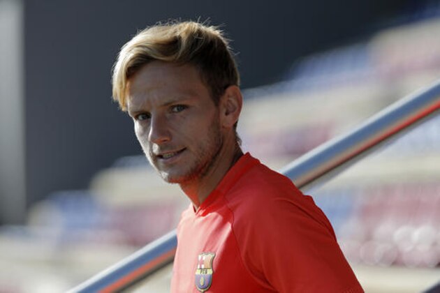 FC Barcelona's Ivan Rakitic attends a training session at the Sports Center FC Barcelona Joan Gamper in Sant Joan Despi, Spain, Saturday, Aug. 27, 2016. (AP Photo/Manu Fernandez)