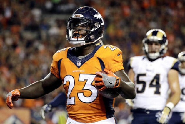 Denver Broncos running back Ronnie Hillman (23) scores a touchdown against the Los Angeles Rams during the second half of an NFL preseason football game, Saturday, Aug. 27, 2016, in Denver. (AP Photo/Jack Dempsey)