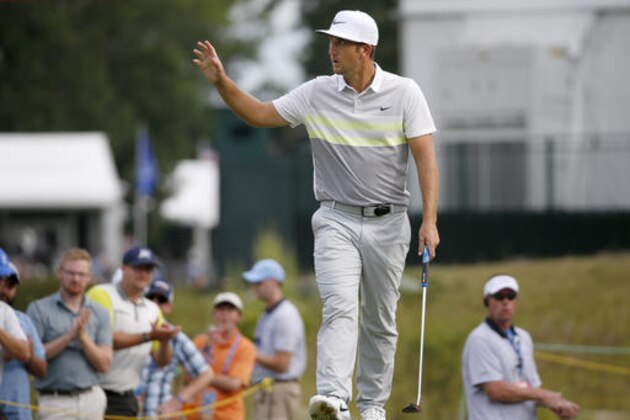 Kevin Chappell acknowledges the crowd after putting out on the 13th hole during the second round of the Deutsche Bank Championship golf tournament, Saturday, Sept. 3, 2016, in Norton, Mass. (AP Photo/Michael Dwyer)