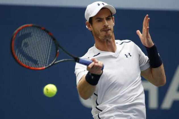 Andy Murray, of the United Kingdom, returns a shot to Paolo Lorenzi, of Italy, during the third round of the U.S. Open tennis tournament, Saturday, Sept. 3, 2016, in New York. (AP Photo/Jason DeCrow)