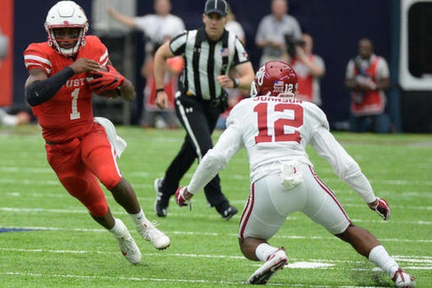 Houston quarterback Greg Ward Jr. (1) runs against Oklahoma defensive back Will Johnson (12) in the first half of an NCAA college football game Saturday, Sept. 3, 2016, in Houston. (AP Photo/George Bridges)