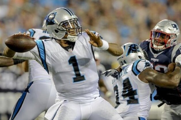Carolina Panthers quarterback Cam Newton (1) looks to pass during an NFL football game against the New England Patriots in Charlotte, N.C., Friday, Aug. 26, 2016. (AP Photo/Mike McCarn)