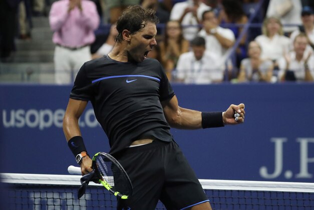 Sep 2, 2016; New York, NY, USA; Rafael Nadal of Spain celebrates after winning match point against Andrey Kuznetsov of Russia (not pictured) on day five of the 2016 U.S. Open tennis tournament at USTA Billie Jean King National Tennis Center. Nadal won 6-1, 6-4, 6-2. Mandatory Credit: Geoff Burke-USA TODAY Sports