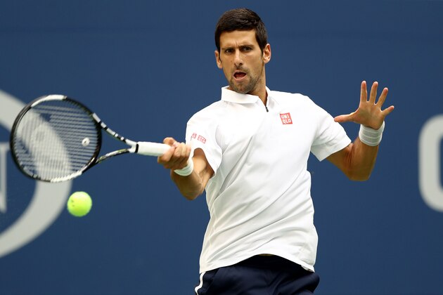 NEW YORK, NY - SEPTEMBER 02: Novak Djokovic of Serbia returns a shot to Mikhail Youzhny of Russia during his third round Men's Singles match on Day Five of the 2016 US Open at the USTA Billie Jean King National Tennis Center on September 2, 2016 in the Flushing neighborhood of the Queens borough of New York City.  (Photo by Elsa/Getty Images)